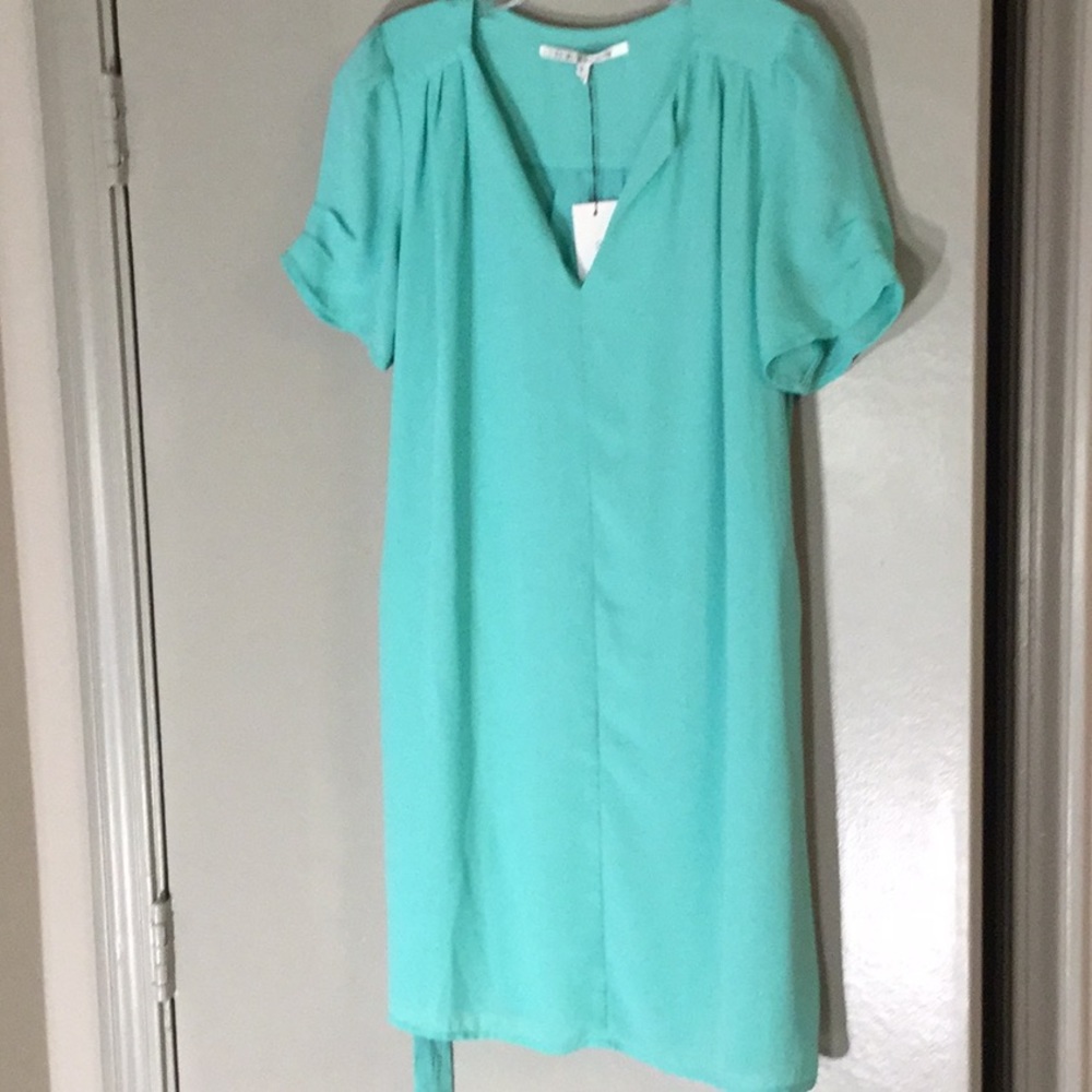 Collective Concepts Lady’s top; Small size.